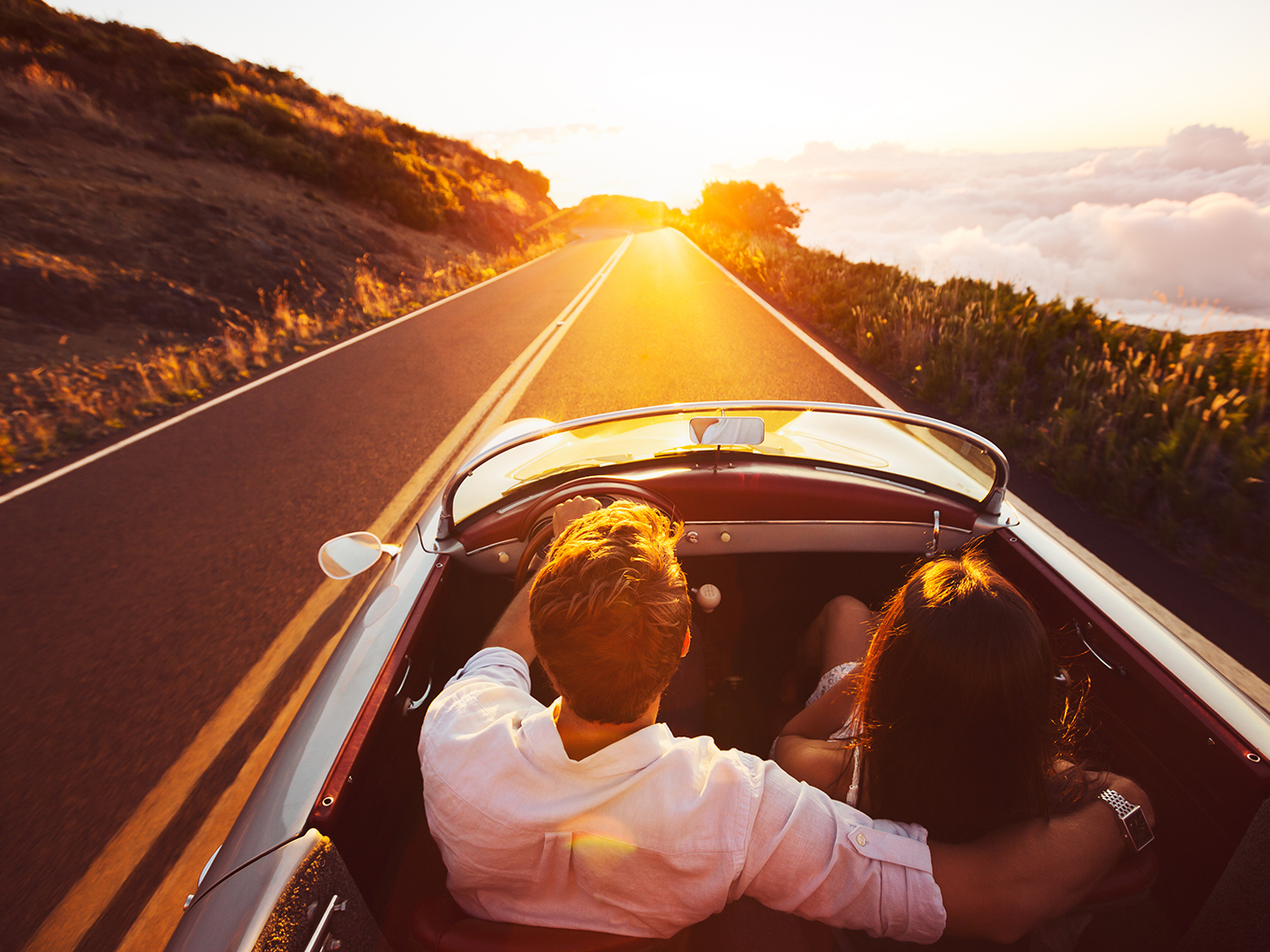Approval Heroes - Join Us on Our Journey Couple in a convertible driving on the open road
