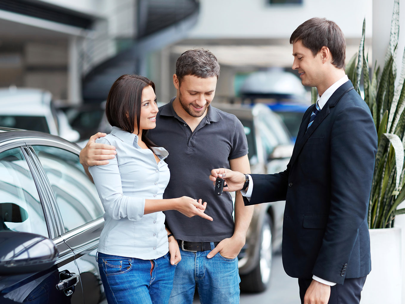 New Vehicle Purchase Couple purchasing a new vehicle with the help of Approval Heroes