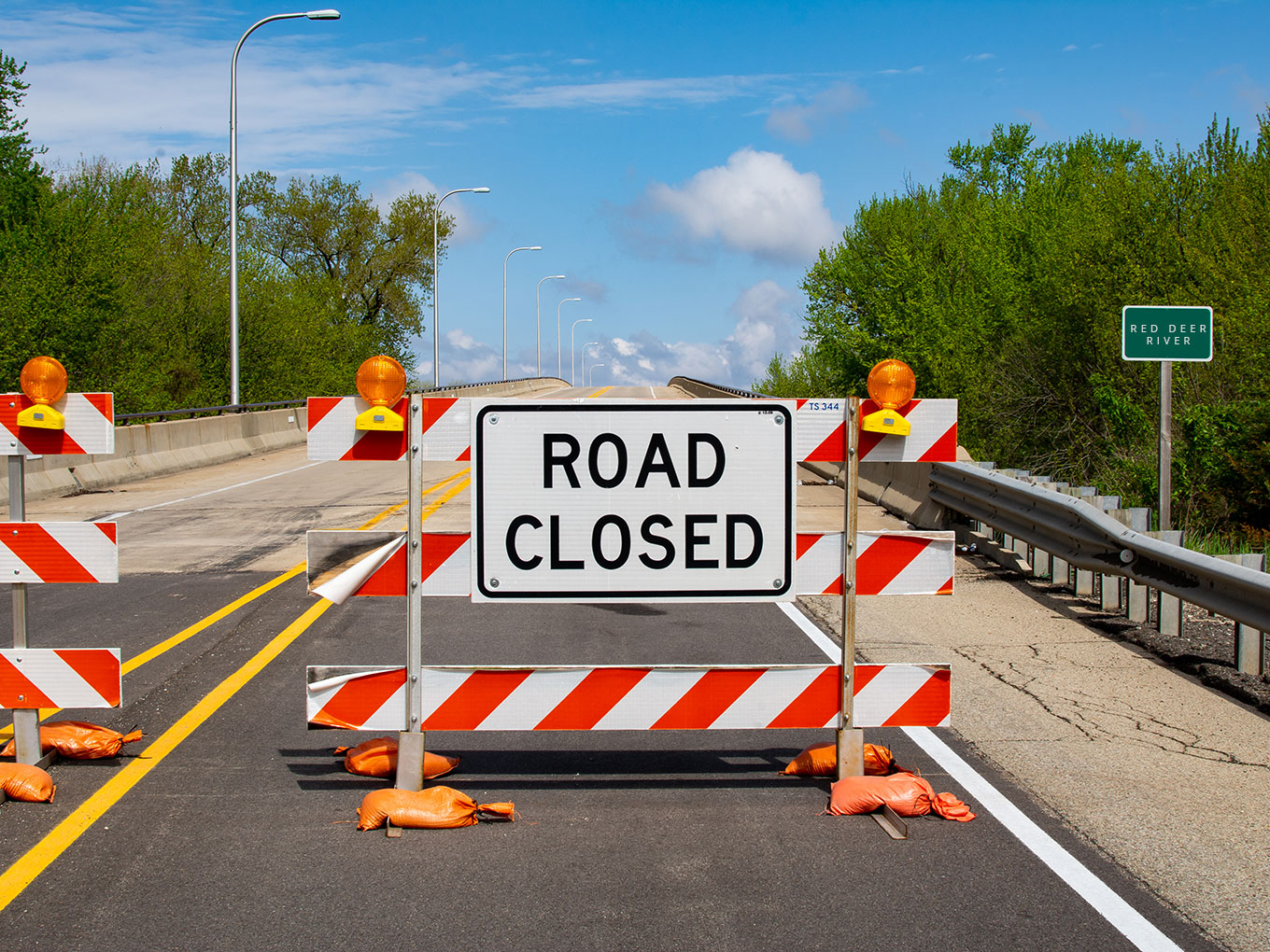 Image of a roadblock sign, representing the challenges often faced when securing a car title loan. With Approval Heroes, these obstacles are transformed into stepping stones towards a brighter financial path.